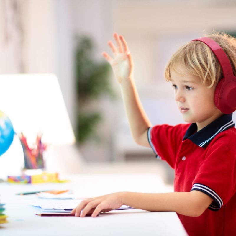 Child preparing for the 11 Plus exam with an online tutor in Wales